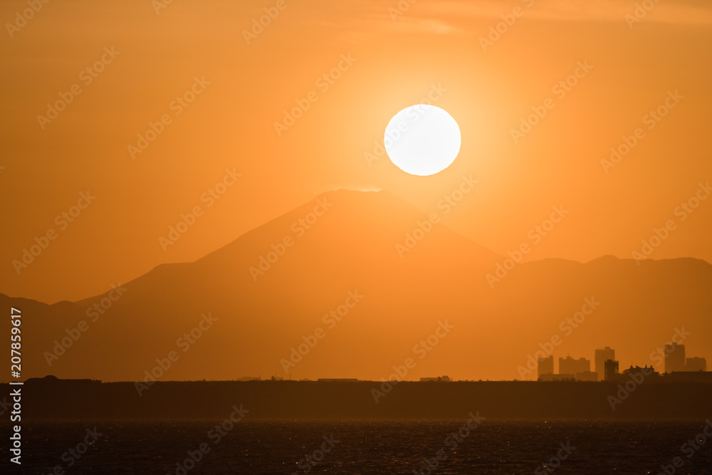 Mountain Fuji and Lake Tanumi with beautiful sunrise in winter season. Lake Tanuki is a lake near Mount Fuji, Japan. Mountain Fuji and Lake Tanumi with beautiful sunrise in winter season. Lake Tanuki is a lake near Mount Fuji, Japan.