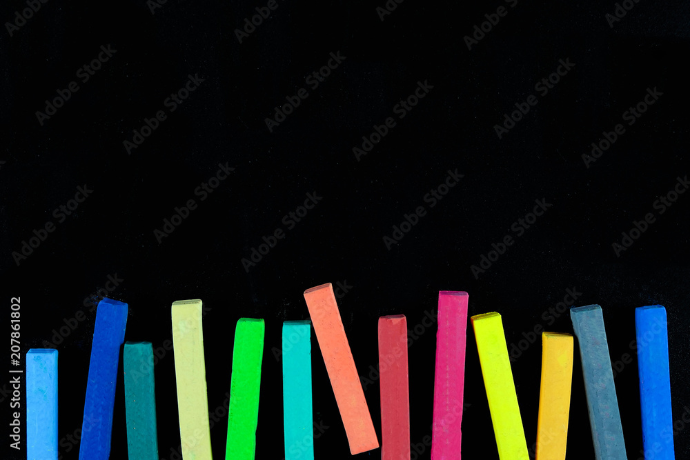 Plakat Colourful chalk pastel on black background, Concept of education background.