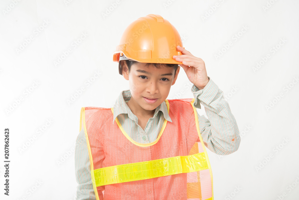 Little engineer boy with protecion hat on his head Little engineer boy with protecion hat on his head