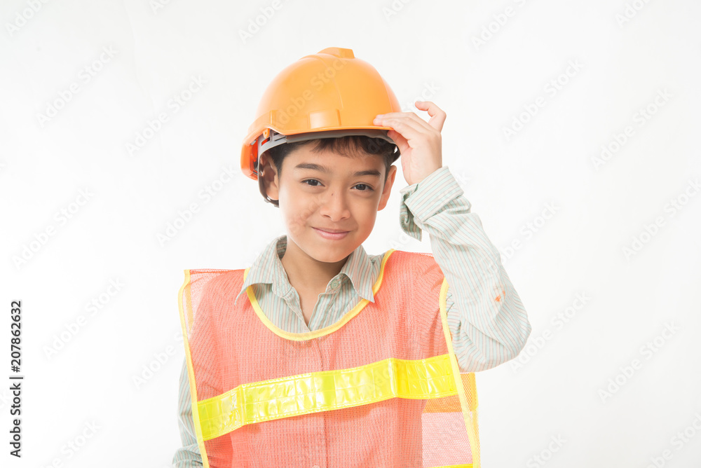 Little engineer boy with protecion hat on his head Little engineer boy with protecion hat on his head