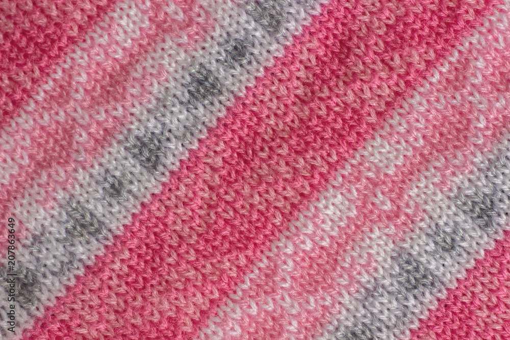 knitted fabric with pattern, handmade. Background, texture