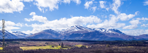 A panorama of the Ben Nevis Range of mountains as seen from Spean Bridge in the Highlands of Scotland.
