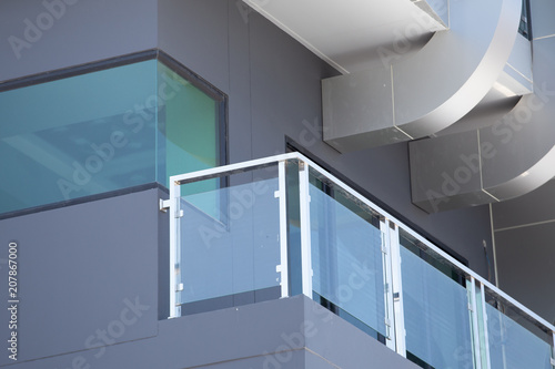 Construction modern style aluminum rail and fall protection. tempered glass