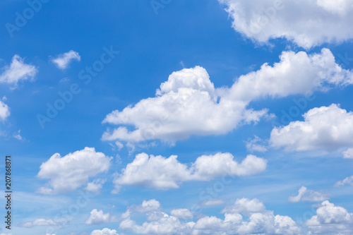 Blue sky with white clouds  rain clouds on sunny summer or spring day for background design.