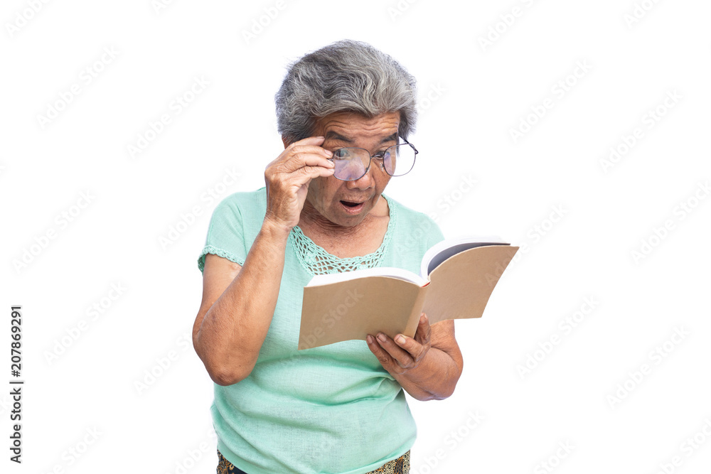 Old woman reading a book on white background Old woman reading a book on white background