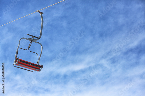 Ski lift on sunny winter day