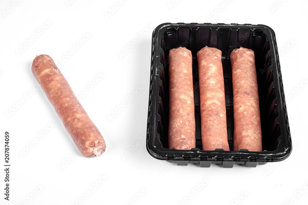 Package of raw sausages isolated on white background Package of raw sausages isolated on white background