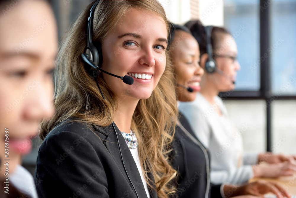 Woman customer service agent working in call center Woman customer service agent working in call center