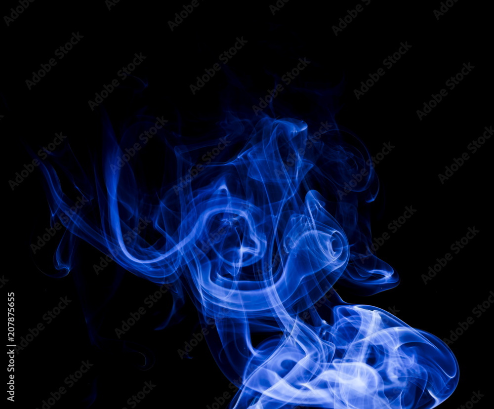 Fototapeta premium Blue smoke on black background