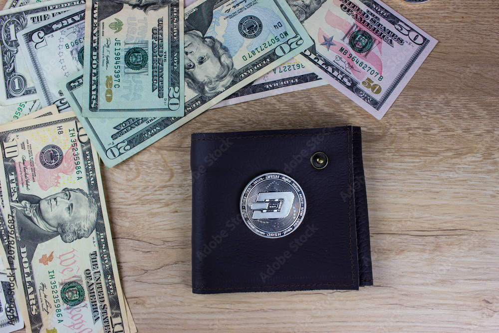 Cryptocurrency Dashcoin. Wallet and USA dollar banknotes. Cryptocurrency Dashcoin. Wallet and USA dollar banknotes.