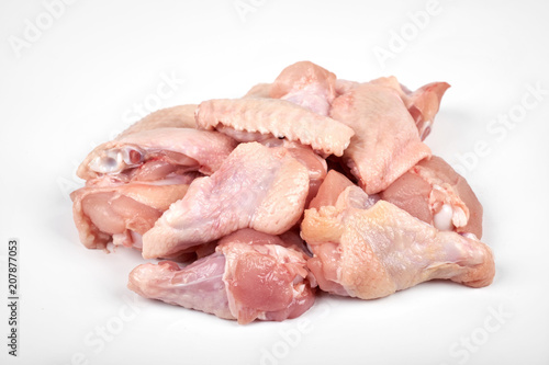 Raw chicken wings isolated on white background