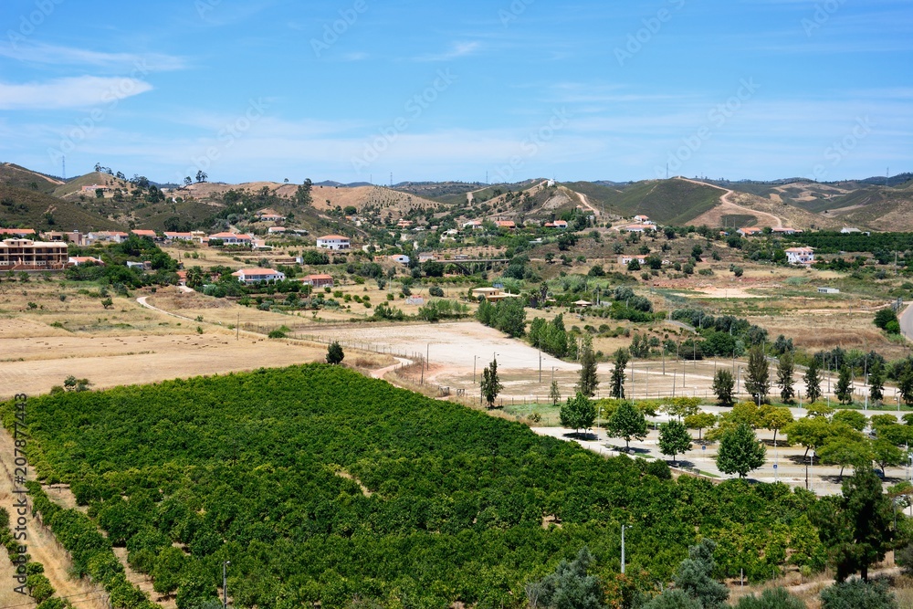 Elevated view of orchards and countryside seen from the castle battlements, Silves, Portugal.
