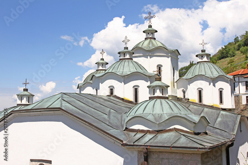 Church of Virgin Mary in a bright sunny day in east orthodox Monastery of St. Joachim of Osogovo, Kriva Palanka, Republic of Macedonia. Church's domes. Christianity. Osogovo Monastery, Macedonia. Sky photo