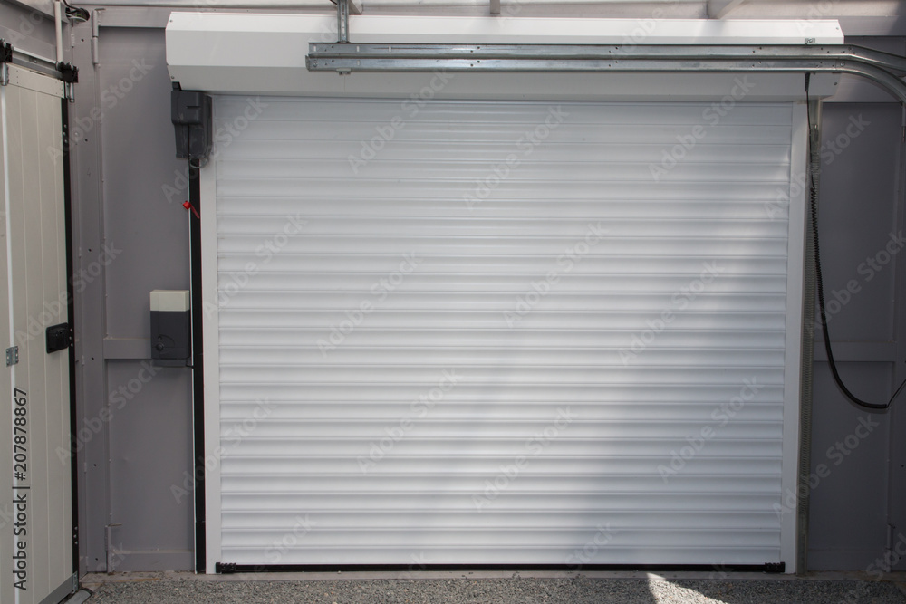 Automatic Electric Roll-up Commercial Garage Gate Push up Door In Modern  Building house Photos | Adobe Stock