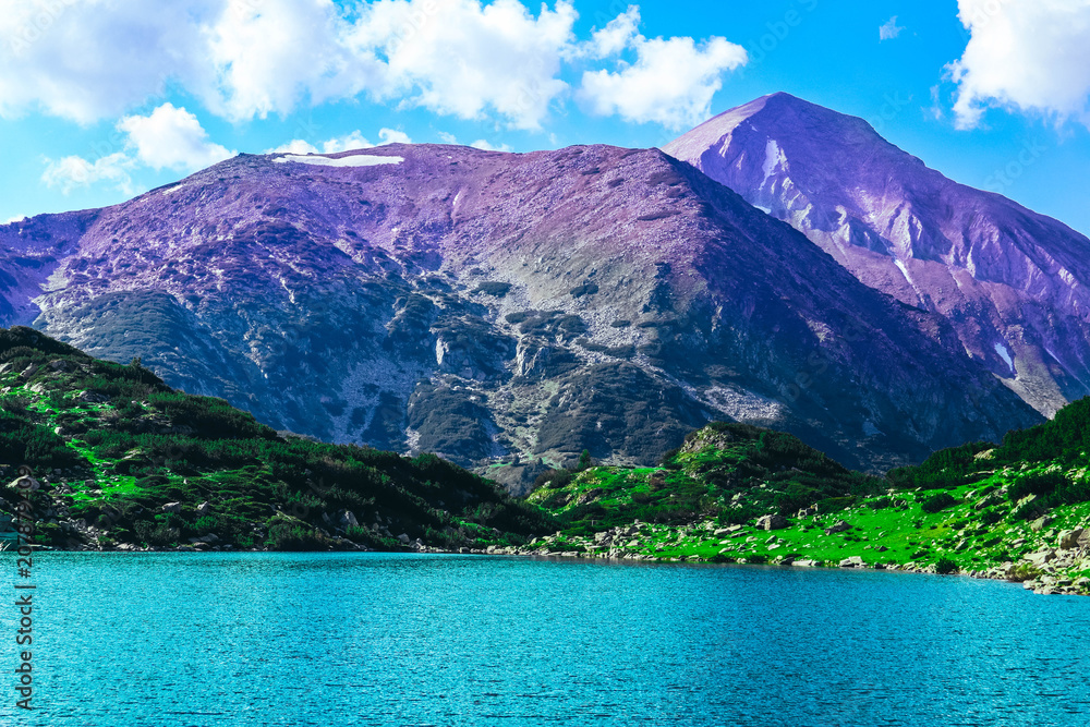 Beautiful alpine lake, river in the high mountains peak, blue sky background. Amazing Mountain hiking paradise landscape, summertime. Beautiful alpine lake, river in the high mountains peak, blue sky background. Amazing Mountain hiking paradise landscape, summertime.