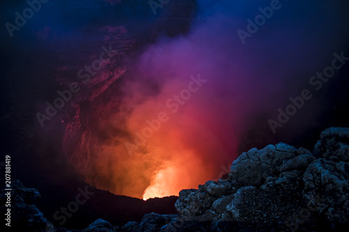 Closeup of the Orange, Glowing Lava in the Crater of the Volcan Masaya Volcano in Nicaragua photo