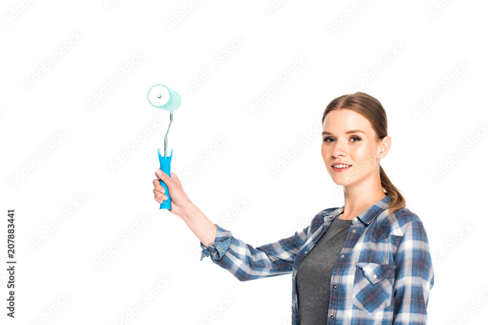 young smiling woman holding paint roller isolated on white background young smiling woman holding paint roller isolated on white background
