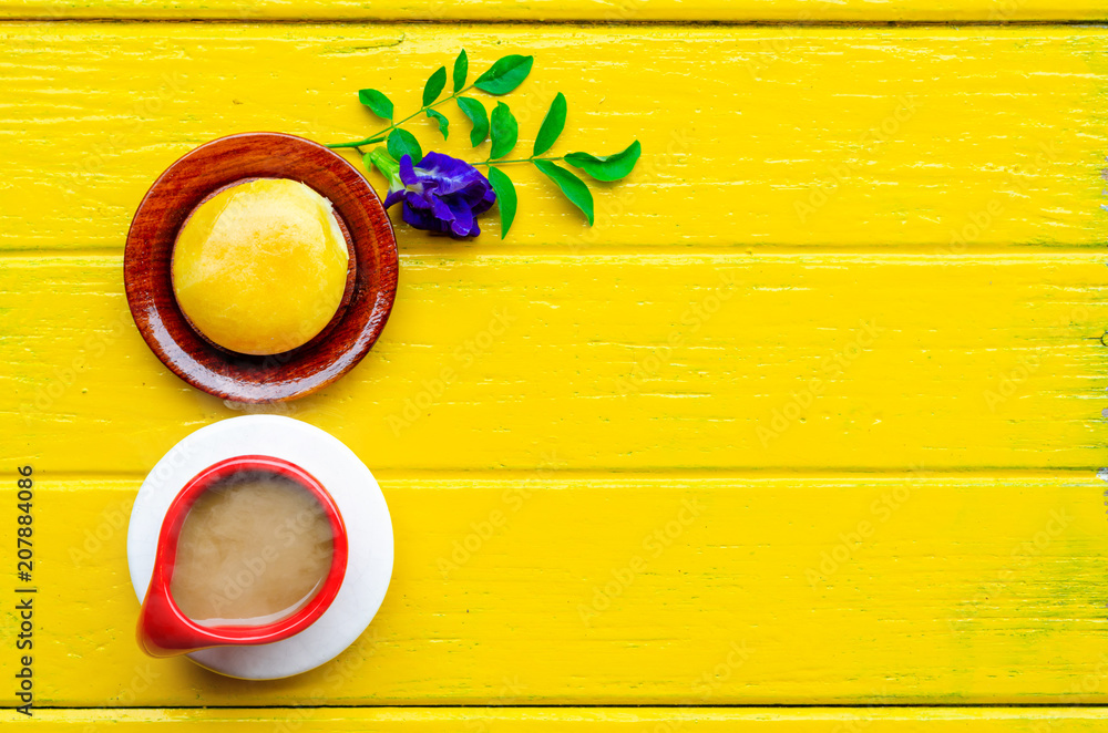 Cup of coffee and yellow pie on yellow background,break time,top view ,empty space. Cup of coffee and yellow pie on yellow background,break time,top view ,empty space.