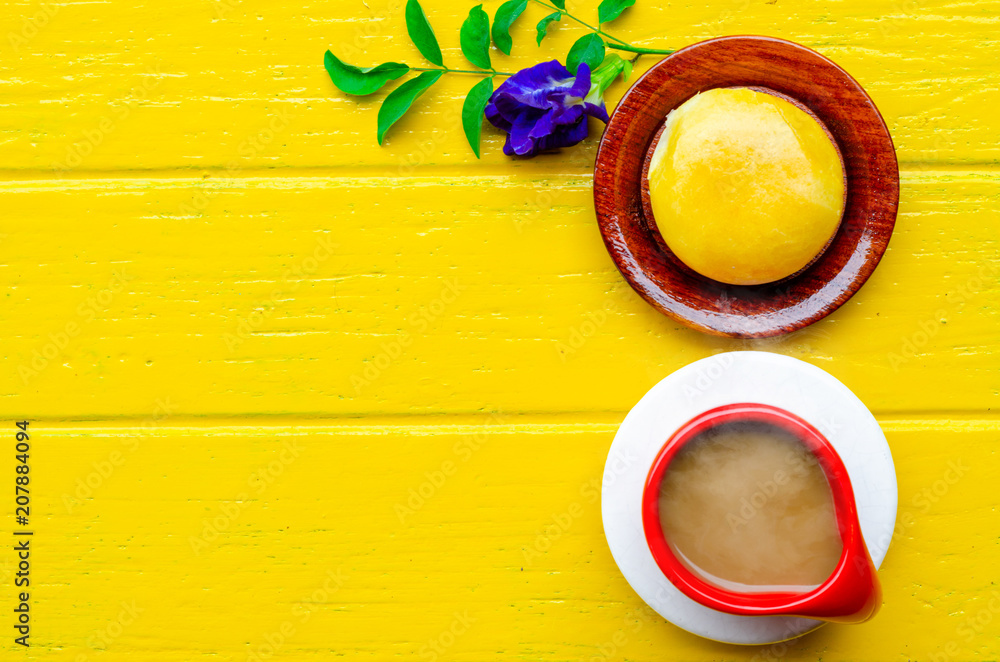 Cup of coffee and yellow pie on yellow background,break time,top view ,empty space. Cup of coffee and yellow pie on yellow background,break time,top view ,empty space.