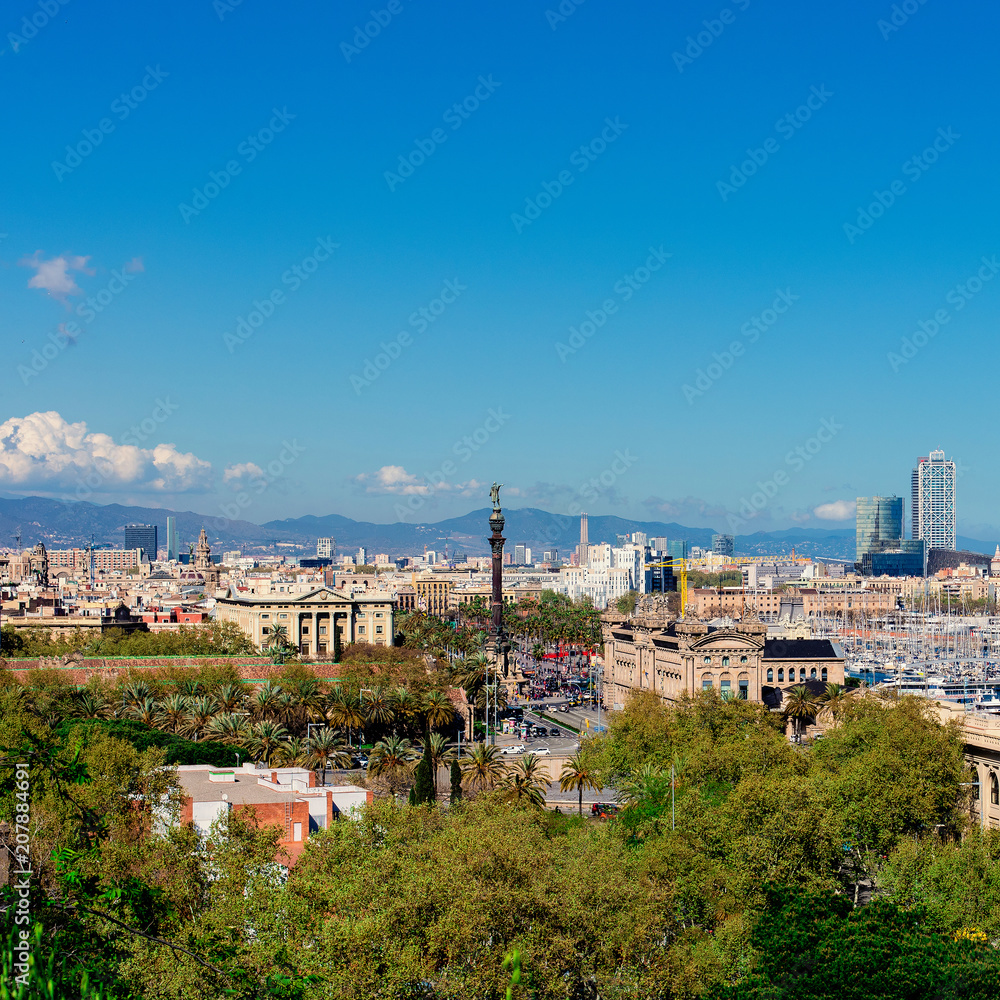 Aerial Panorama view of Barcelona city skyline over Passeig de Colom or Columbus avenue and Port Vell marina