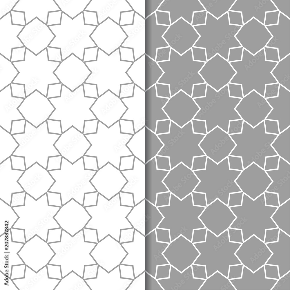 Gray and white geometric ornaments. Set of seamless patterns