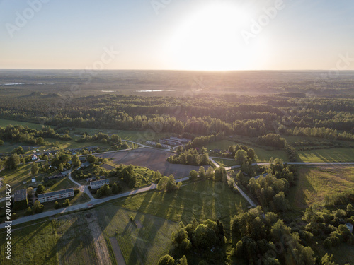 Fototapeta Naklejka Na Ścianę i Meble -  drone image. aerial view of rural sunset with long shadows