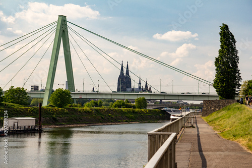 Quay of the Rhine in Cologne. View of St. Severin Bridge and Cologne Cathedral