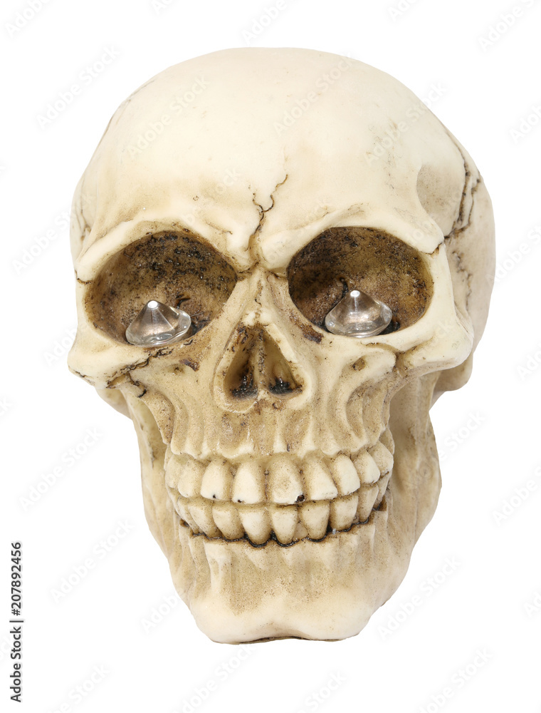 human skull with precious diamonds in the empty eye sockets human skull with precious diamonds in the empty eye sockets