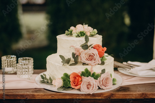 rustic wedding cake on wedding banquet photo