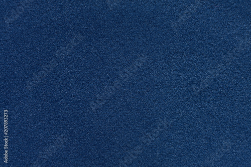 Soft fabric texture in saturated dark blue colour.