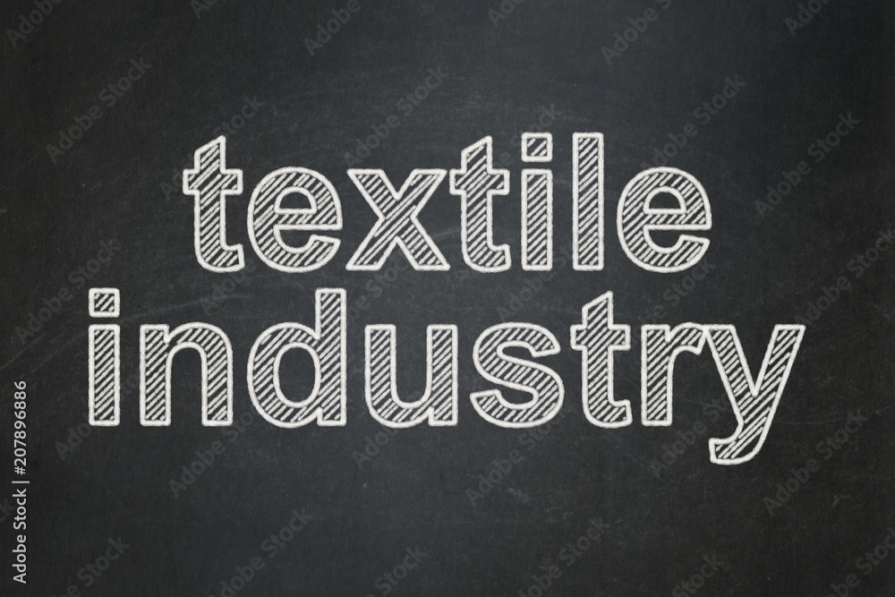 Fototapeta premium Industry concept: text Textile Industry on Black chalkboard background