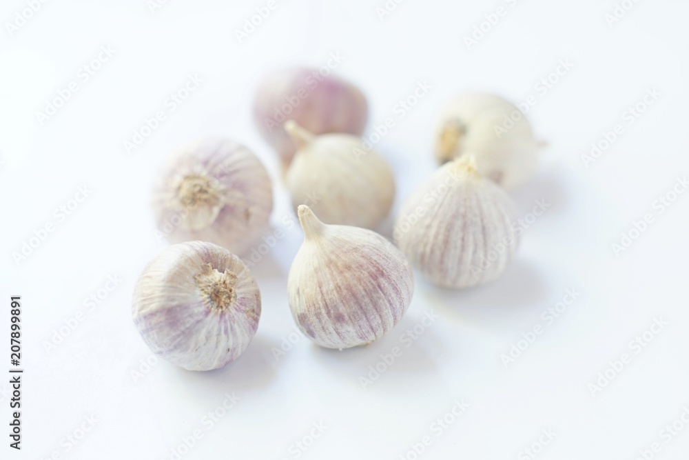 Fresh garlic on white background, copy space Fresh garlic on white background, copy space