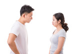 Portrait of angry couple looking at each other during conflict