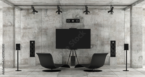 Foto Home cinema system in a concrete room