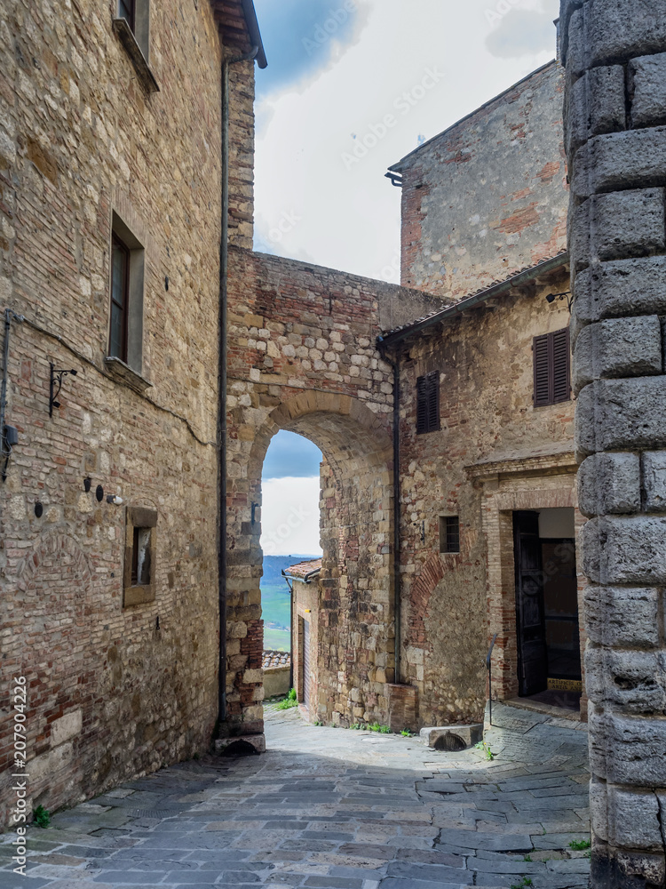 Small narrow streets in wine city of Montepulciano in Tuscany, Italy