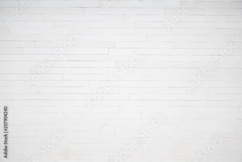 Tile wall with rough floor.