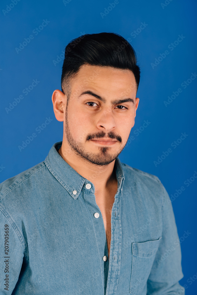 Obraz premium Cool smile face and pose of confidence Asian man with beard.