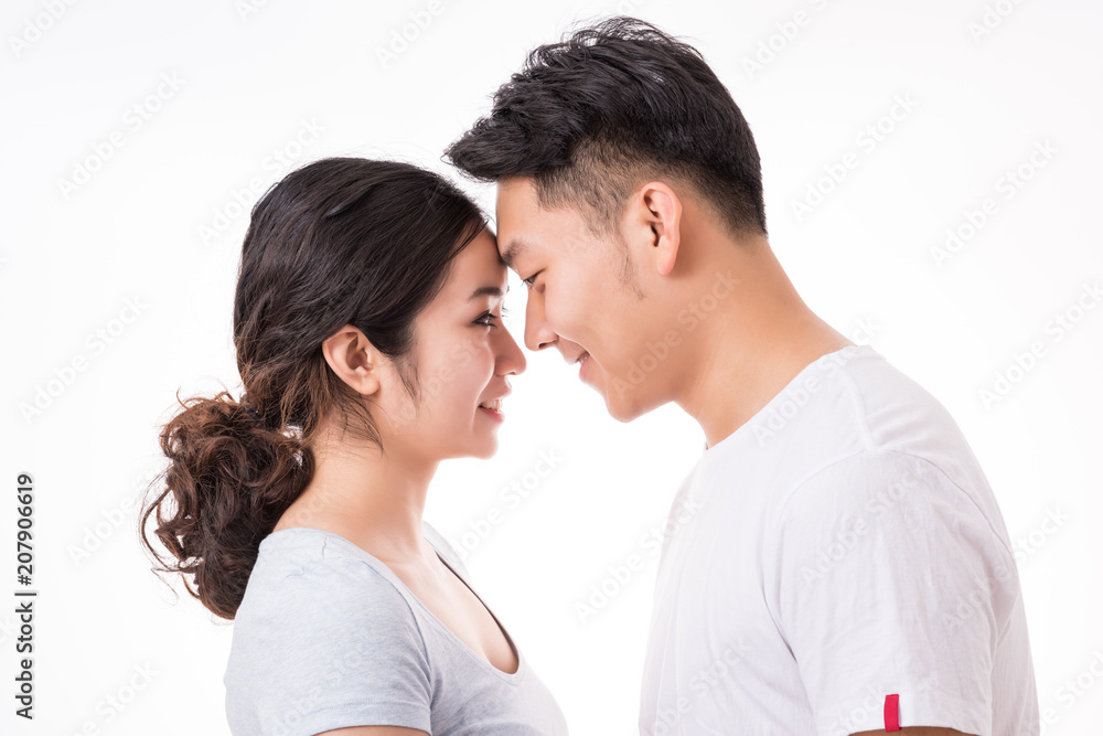 Smiling Young Couple Looking At Each Other Smiling Young Couple Looking At Each Other