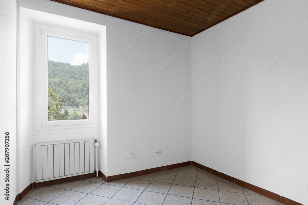 Fototapeta premium White and completely empty room with wood on the ceiling