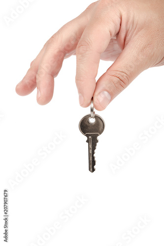 Keys from the lock in hand on white background.