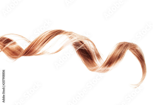 strawberry blond strand of hair isolated on white background