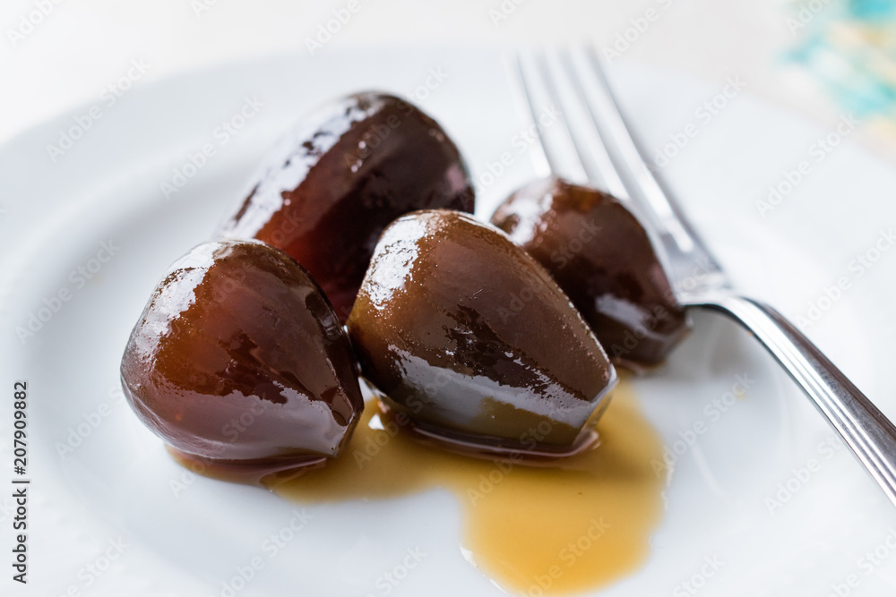 Turkish Style Crispy Fig Dessert served with Plate and Fork / Fruit Jam Dessert Turkish Style Crispy Fig Dessert served with Plate and Fork / Fruit Jam Dessert