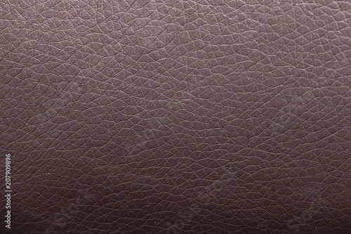 Brown leather material as an abstract background