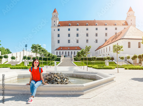Photography Young happy female tourist in Bratislava city near Castle or Hrad
