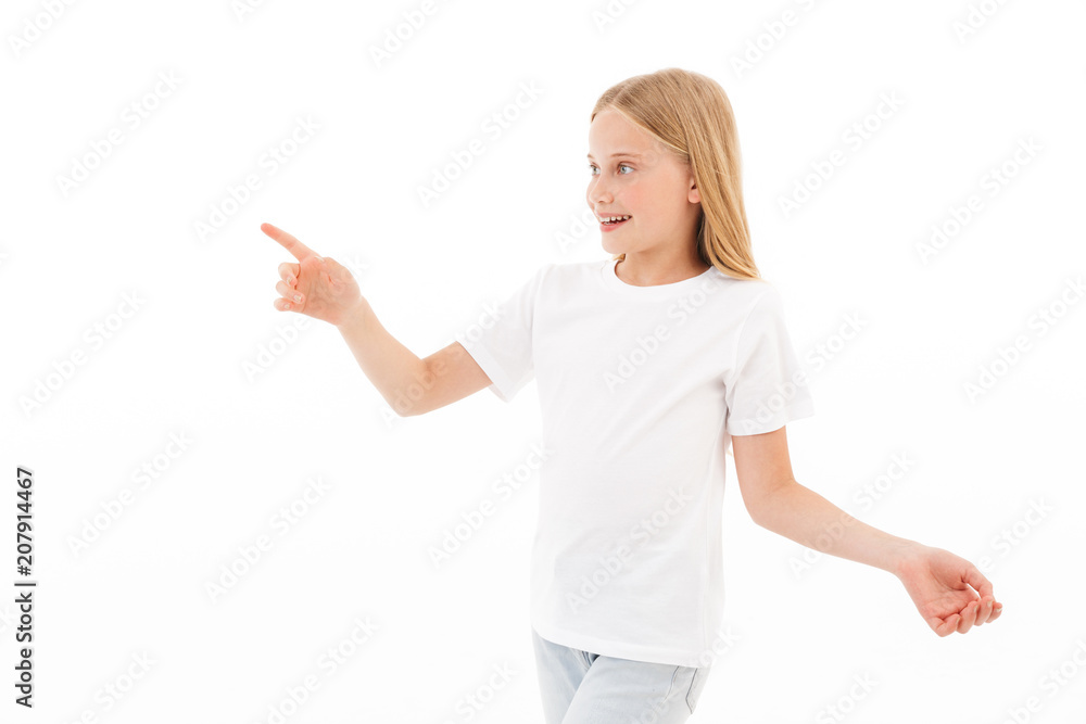 Pretty cute girl standing isolated pointing. Pretty cute girl standing isolated pointing.