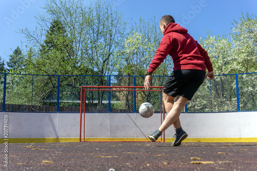 teenager playing football rabona