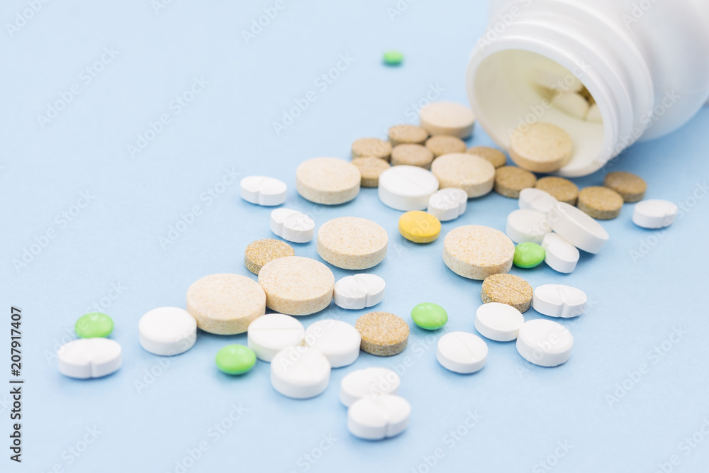 pills on a blue background