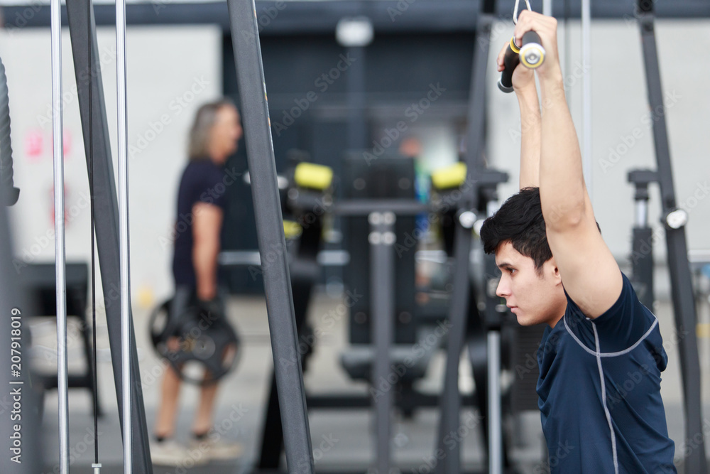 Asian man exercising in the gym, Asian man exercising in the gym,