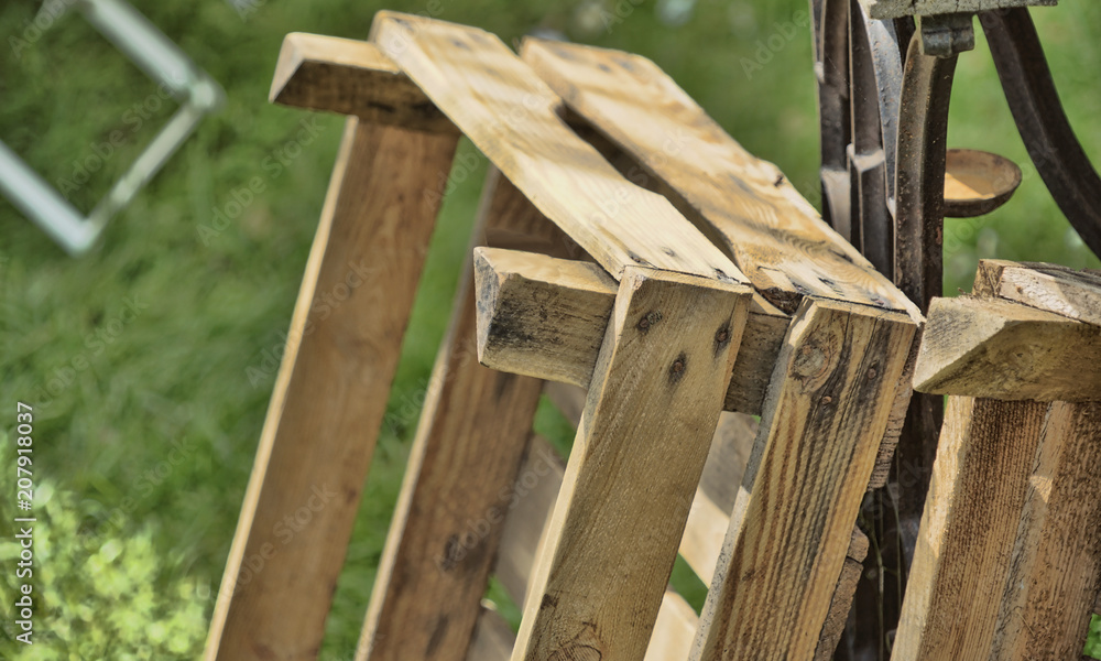 Detail of an old ugly dirty wooden box made of planks Detail of an old ugly dirty wooden box made of planks