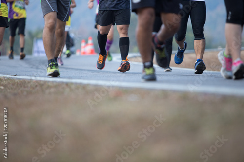 Group of people running race marathon © Somkiat